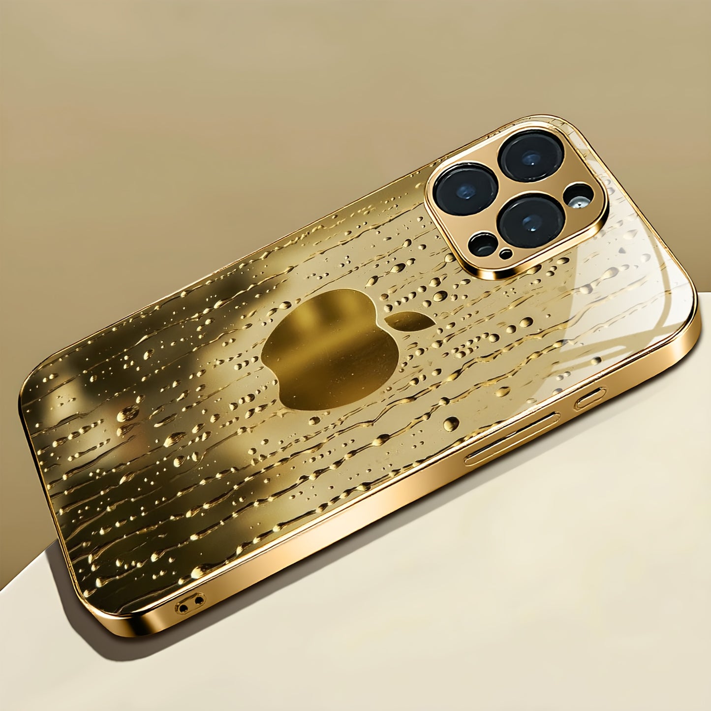A Golden-Plated Phone Case with an Apple Pattern, Compatible with for iphone 16/16 Pro/16 Plus/16 Pro Max/15/15 Pro/15 Pro Max/14/14 Pro/14 Plus/14 Pro Max/13/13 Pro/13 Pro Max/13 Mini/12/11. It Features a Full-Cover Tempered