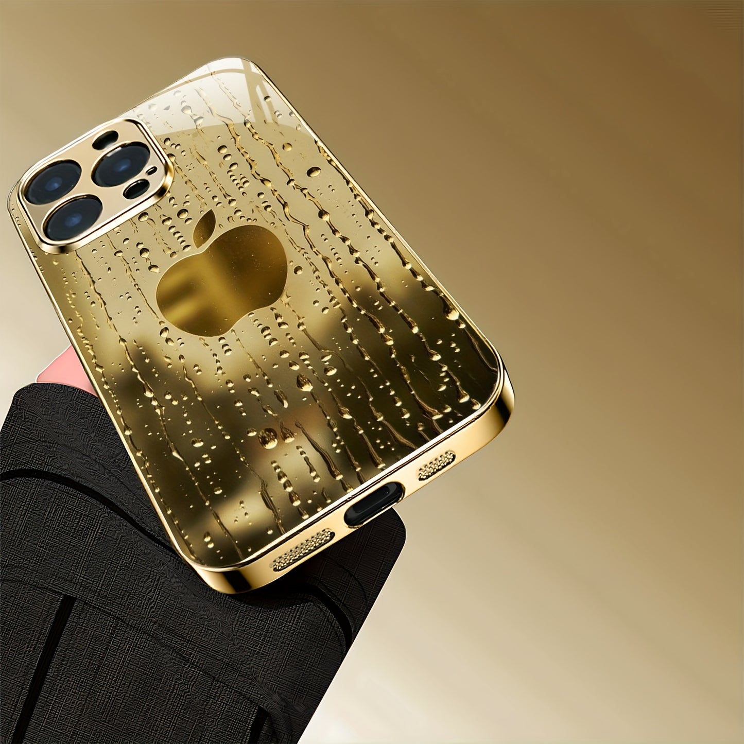 A Golden-Plated Phone Case with an Apple Pattern, Compatible with for iphone 16/16 Pro/16 Plus/16 Pro Max/15/15 Pro/15 Pro Max/14/14 Pro/14 Plus/14 Pro Max/13/13 Pro/13 Pro Max/13 Mini/12/11. It Features a Full-Cover Tempered
