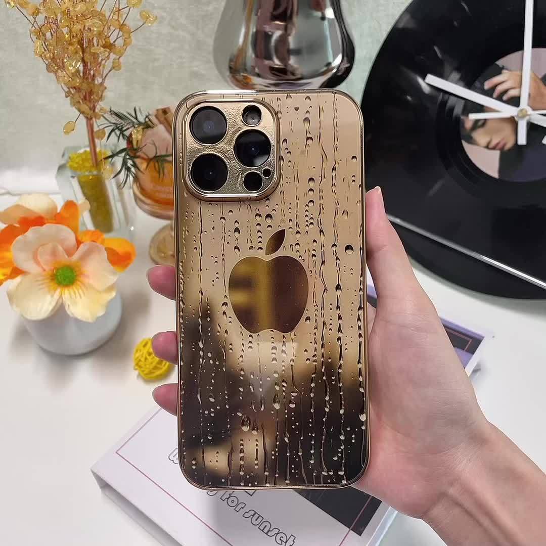 A Golden-Plated Phone Case with an Apple Pattern, Compatible with for iphone 16/16 Pro/16 Plus/16 Pro Max/15/15 Pro/15 Pro Max/14/14 Pro/14 Plus/14 Pro Max/13/13 Pro/13 Pro Max/13 Mini/12/11. It Features a Full-Cover Tempered