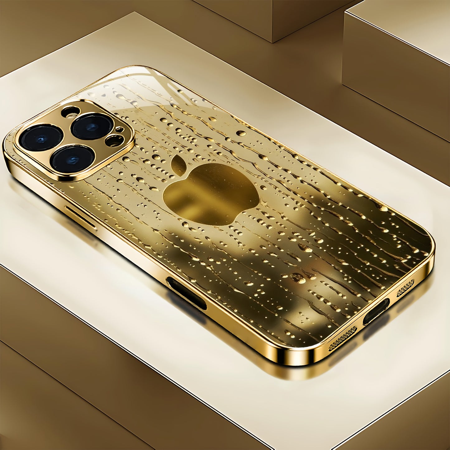 A Golden-Plated Phone Case with an Apple Pattern, Compatible with for iphone 16/16 Pro/16 Plus/16 Pro Max/15/15 Pro/15 Pro Max/14/14 Pro/14 Plus/14 Pro Max/13/13 Pro/13 Pro Max/13 Mini/12/11. It Features a Full-Cover Tempered